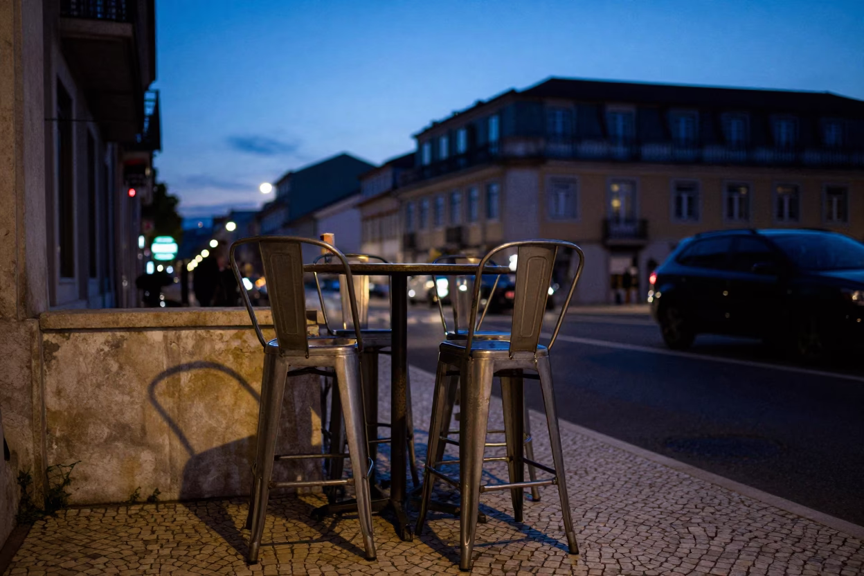 Lisbon Indigo Twilight Street Scene with Bar Stools and Urban Architecture in in Lisbon, Portugal