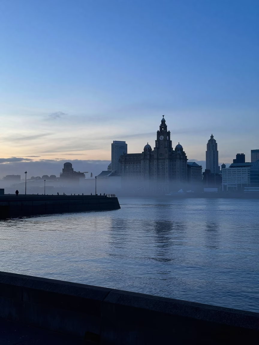 Liverpool Dawn Harbor View with Blue Hour Sky and Breakwater Silhouette in in Liverpool, United Kingdom