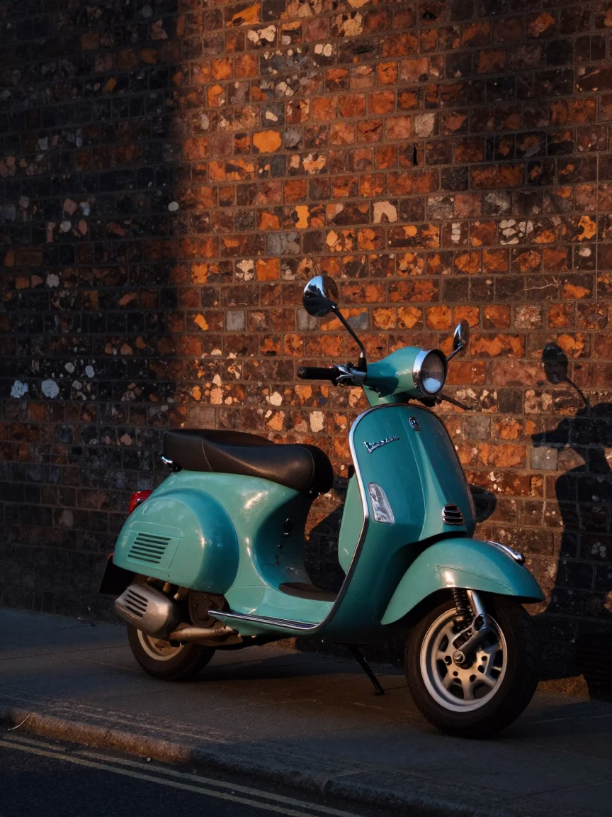 Liverpool Early Evening Street Scene with Vintage Vespa on Cobblestone Lane in in Liverpool, United Kingdom