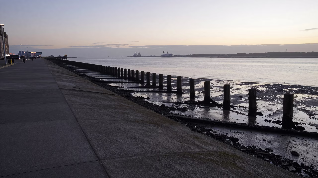 Liverpool Ferry Terminal Ramp at Pre-Dawn Low Tide with Coastal Infrastructure in in Liverpool, United Kingdom