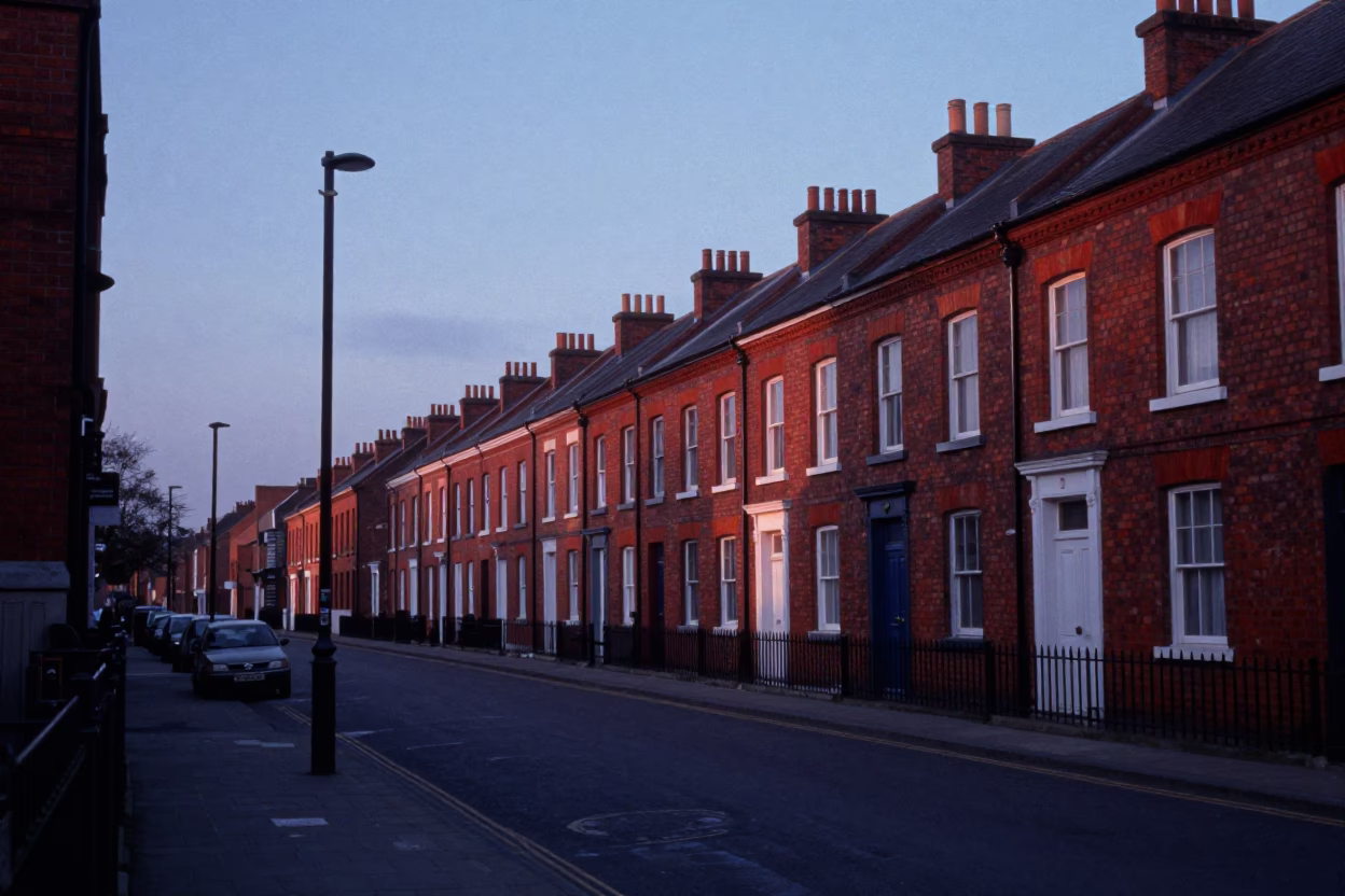 Liverpool Pre-Dawn Street Scene with Red Brick Architecture and Wet Pavement Reflections in in Liverpool, United Kingdom