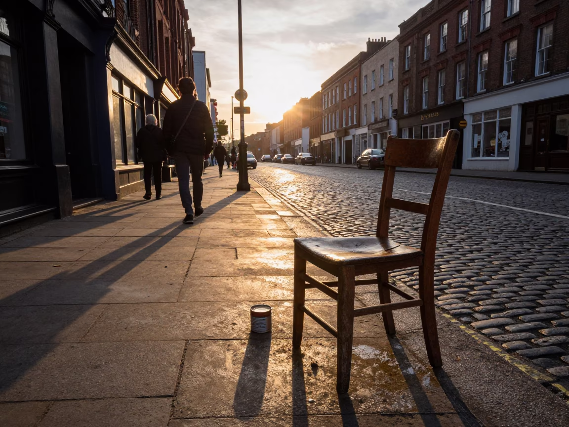Liverpool Sunset Street Scene with Tea Tin and Chair Outside Local Shop in in Liverpool, United Kingdom