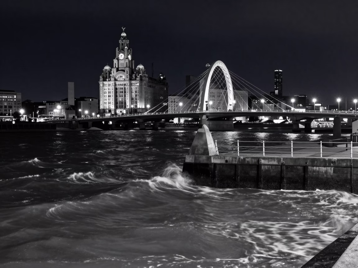 Liverpool waterfront night scene with bridge pier cutwater and sewage pumping station details in in Liverpool, United Kingdom
