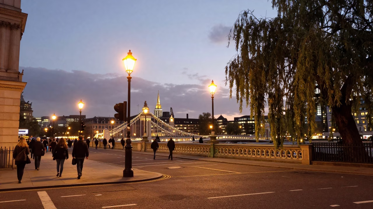 London Evening Street Scene with Bridge Pier and Willow Tree in City Lights in in London, United Kingdom