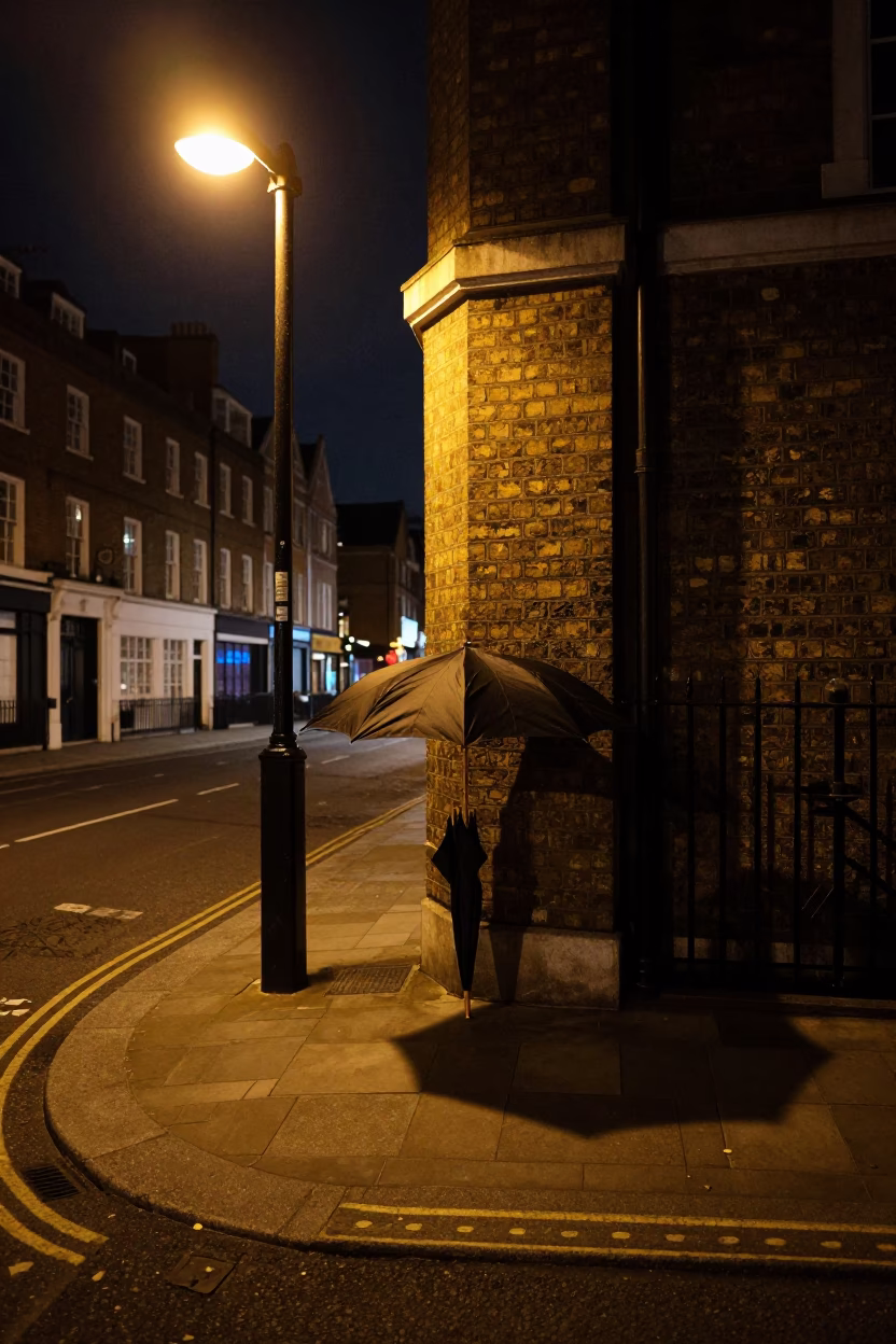 London Street Corner at Night with Umbrella Stand and Distant City Lights in in London, United Kingdom