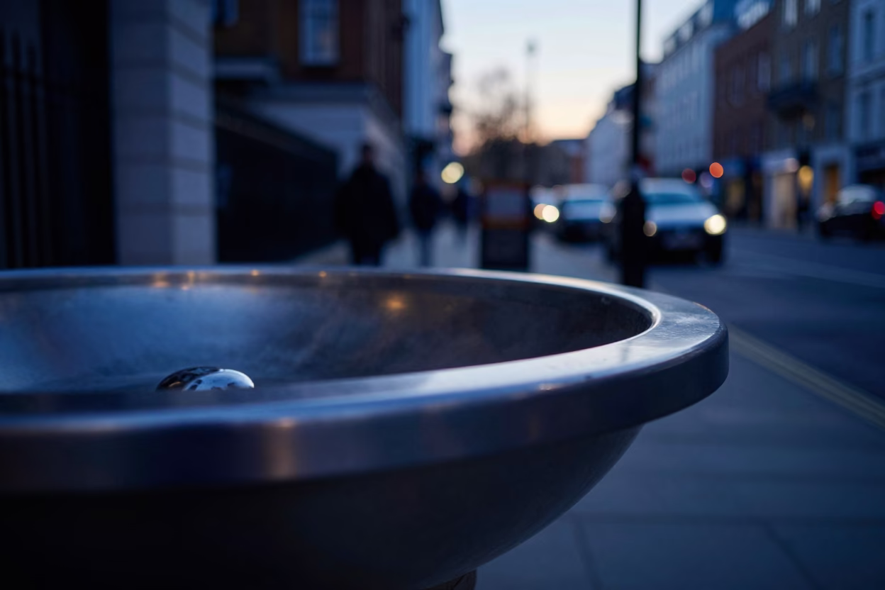 London street corner before sunrise with brushed steel basin and power substation in in London, United Kingdom