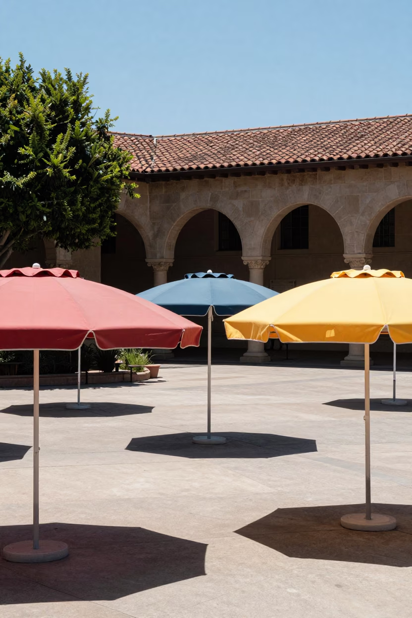 Los Angeles Courtyard Under Flat Noon Glare With Umbrellas And Stone Architecture in in Los Angeles, California, United States