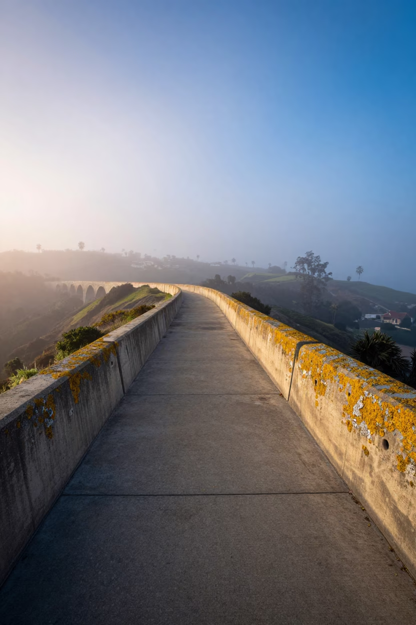 Los Angeles Nautical Dawn Aqueduct Path with Lichen Parapets and Urban Morning Light in in Los Angeles, California, United States