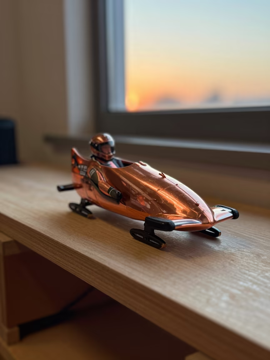 Luge Athlete Model in Copper Light in on a workshop shelf near Cagua