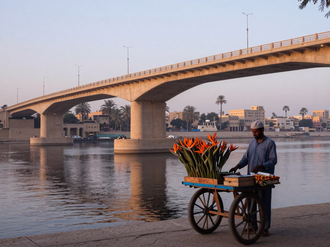 Luxor Dawn Street Scene with Bird of Paradise Flower and Bridge Pier in in Luxor, Egypt