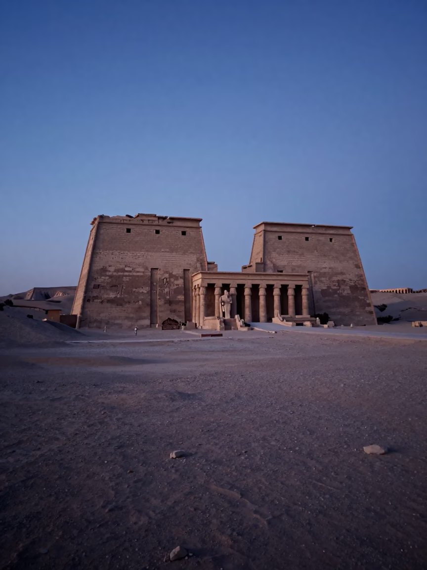 Luxor Egypt Pre-Dawn Landscape with Sandstone Temples and Faded Blue Van in in Luxor, Egypt