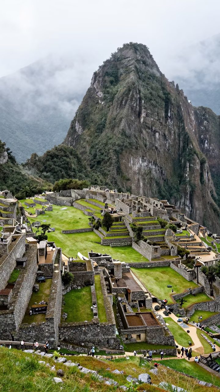 Machu Picchu Terraces Above Cloud Forest Ridge in from a ridge above layered foothills near N'Djamena