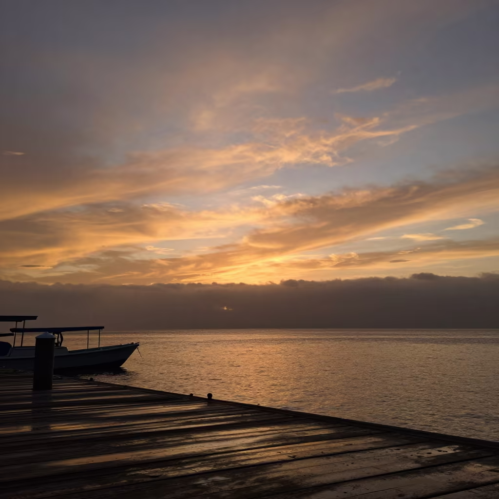 Mackerel Sky Sunset Over Jamaican Harbor Fog in through low marine fog in Jamaica