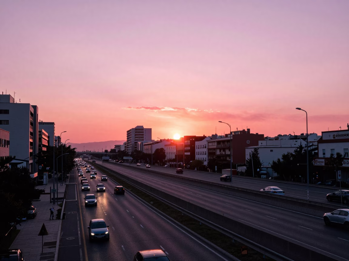 Madrid Spain Evening Skyline Highway Flyover Stack Against Pink Sunset Horizon in in Madrid, Spain