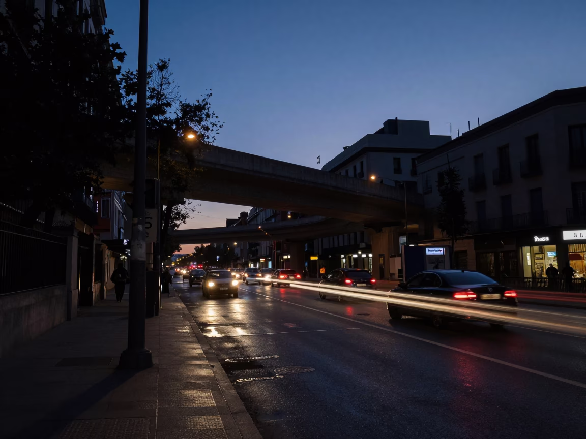 Madrid Spain Predawn Street Scene with Taillight Streaks and Urban Overpass Interchange in in Madrid, Spain