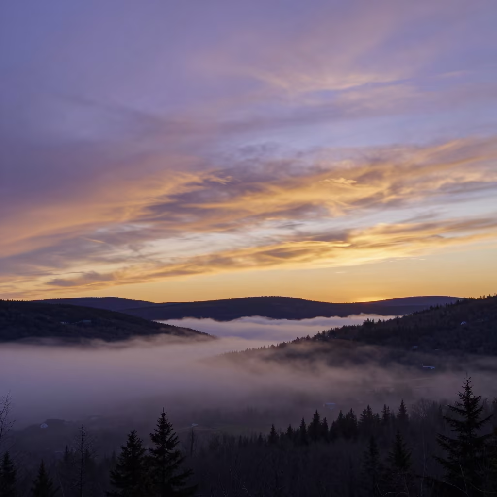 Mammatus Clouds Sunset Over Quebec Fog in through low marine fog in Quebec