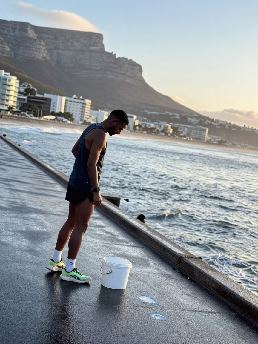 Marathon Runner at Cape Town Harbor Dawn in at a harbor quay near Green Point, Cape Town