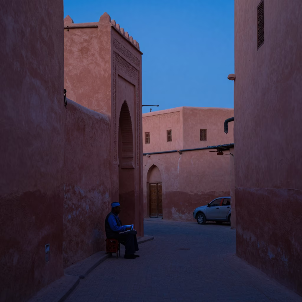 Marrakech Morocco Pre-Dawn Street Scene with Local Vendor and Traditional Architecture in in Marrakech, Morocco