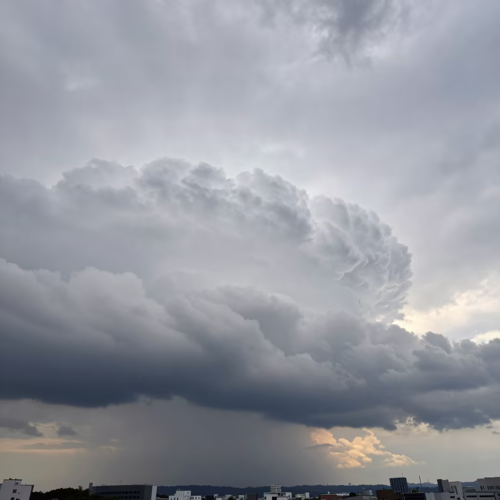 Massive Shelf Cloud Over Tokyo Morning Sky in over a horizon of stacked thunderheads near Tokyo