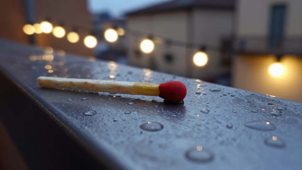 Match Head Phosphorus Coating on Rainy Metal in across a rain-beaded metal surface in Bologna