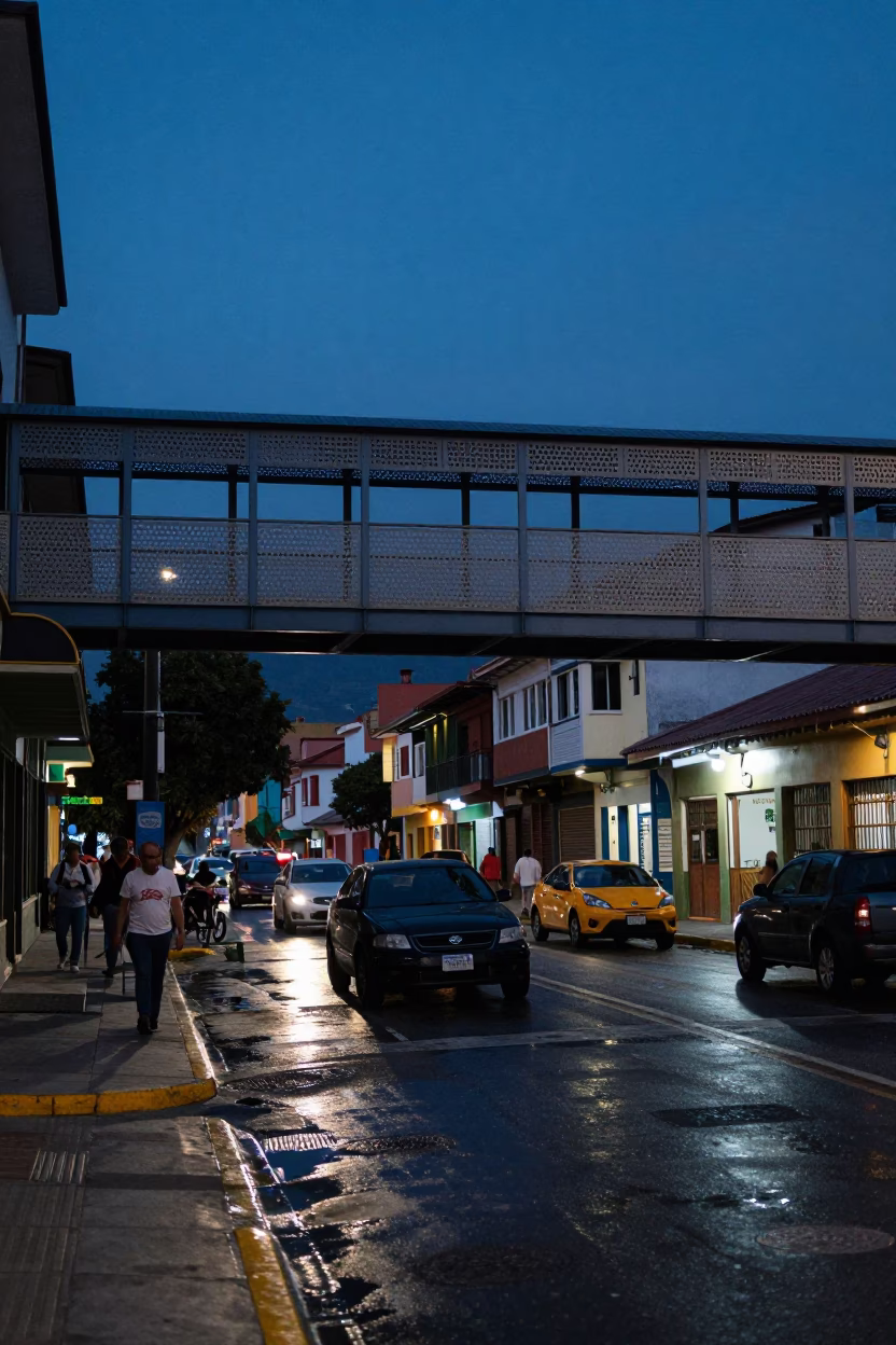 Medellin Colombia Twilight Street Scene with Pedestrian Overpass and Pizza Oven in in Medellin, Colombia