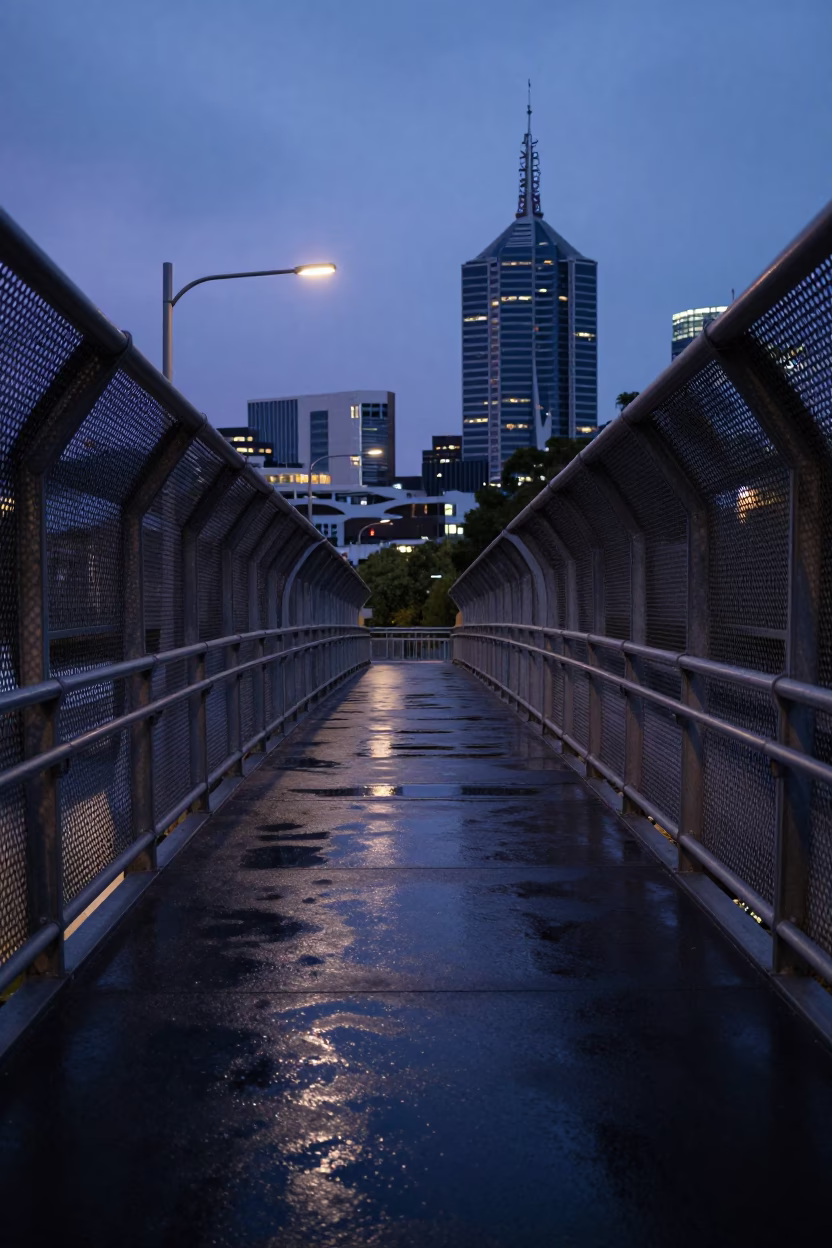 Melbourne Indigo Twilight Pedestrian Overpass with Wet Footsteps and Ivy Vines in in Melbourne, Victoria, Australia