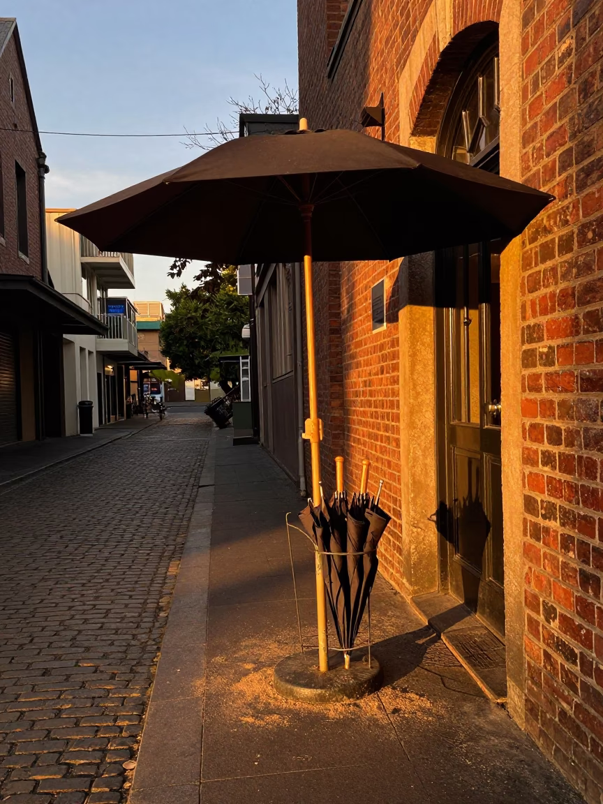 Melbourne Laneway Coffee Shop Umbrella Stand in Honeyed Evening Light in in Melbourne, Victoria, Australia