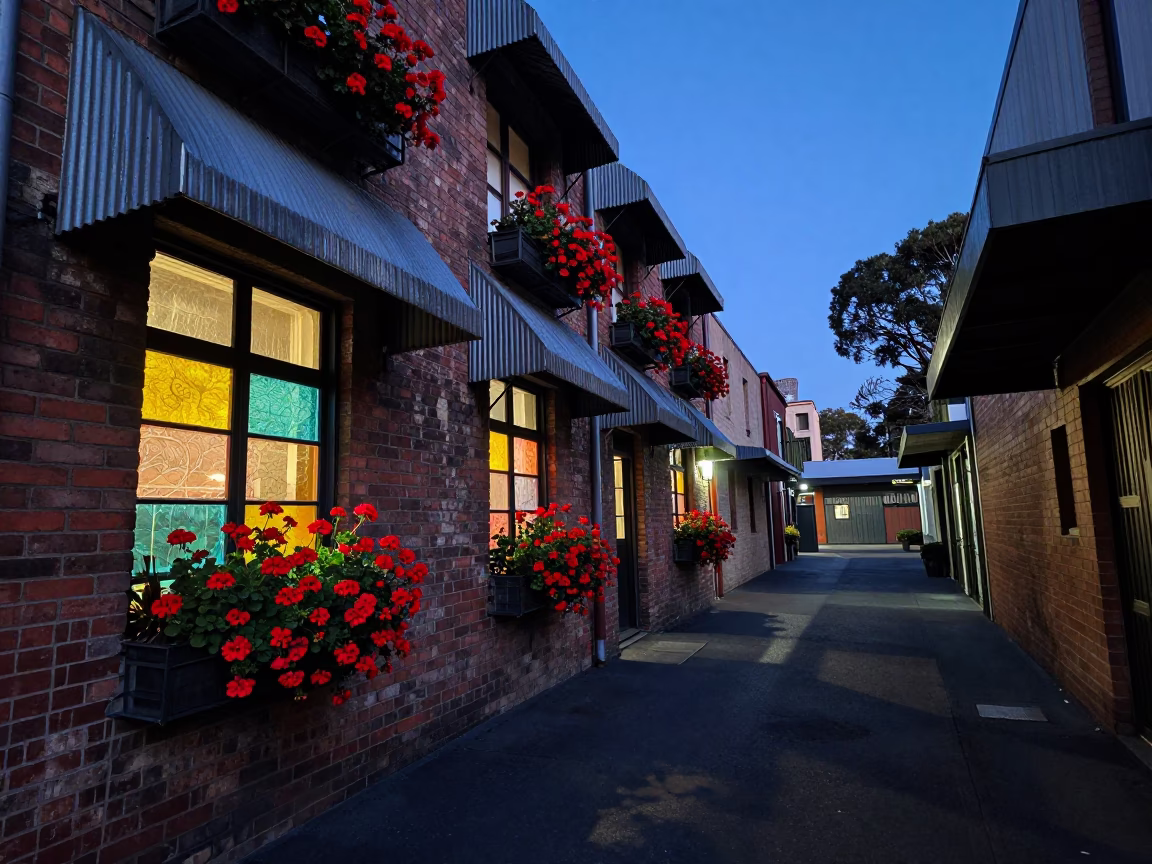 Melbourne laneway twilight scene with geraniums and colorful glass bottles in Victorian heritage architecture in in Melbourne, Victoria, Australia