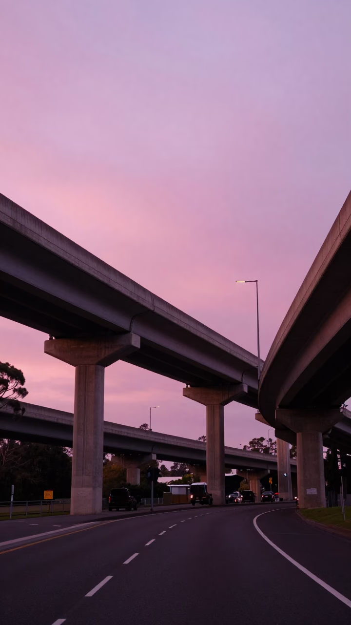 Melbourne Twilight Highway Flyover Stack Cutting Across Pink Evening Sky in in Melbourne, Victoria, Australia