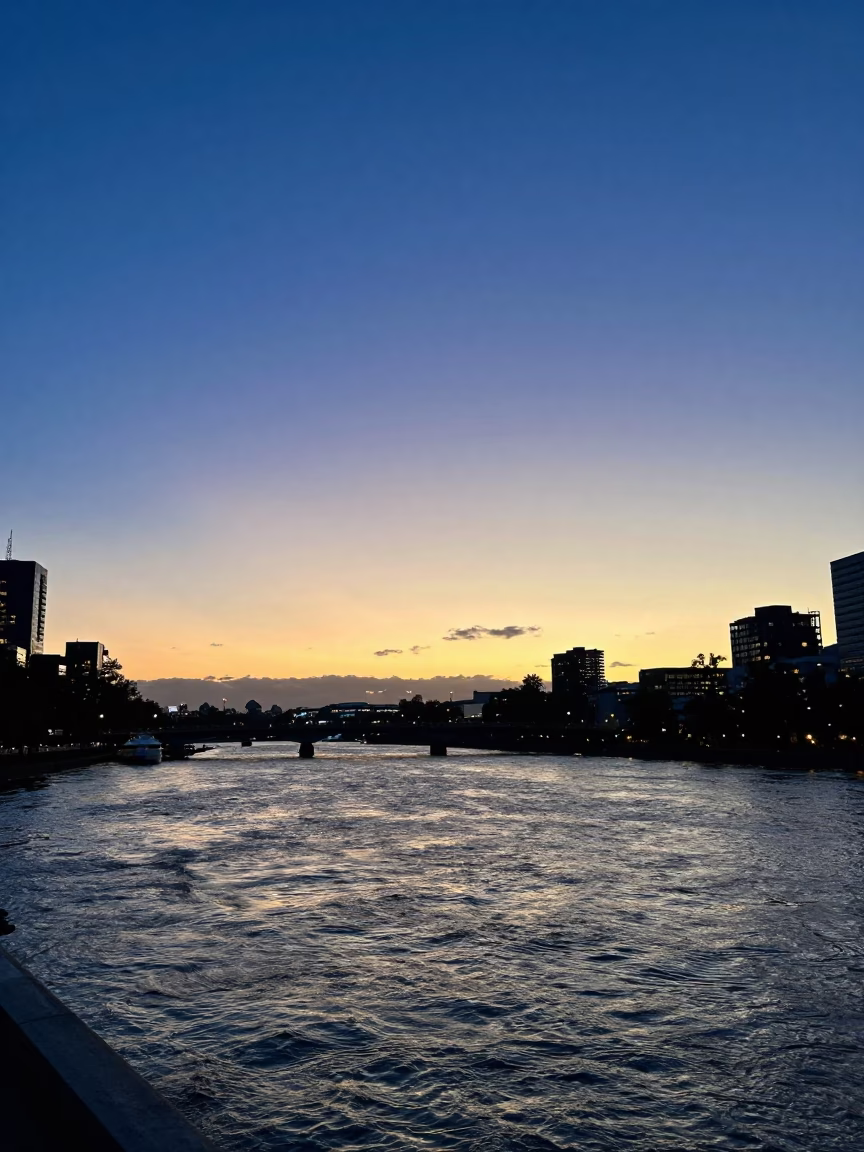 Melbourne Yarra River Sunset with Bridge Pier Inspection Ladder and Choppy Water in in Melbourne, Victoria, Australia