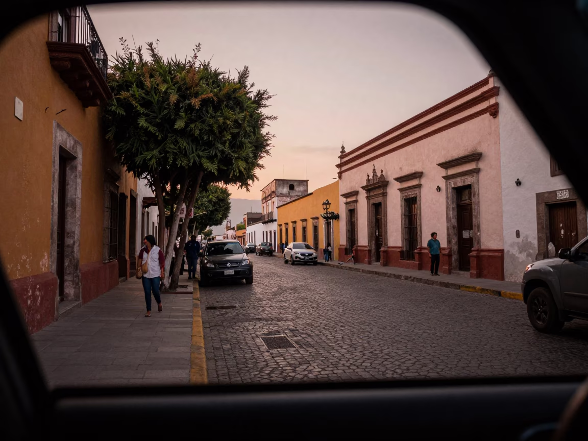 Merida Mexico street scene before dusk with condensation on lens and local activity in in Merida, Mexico