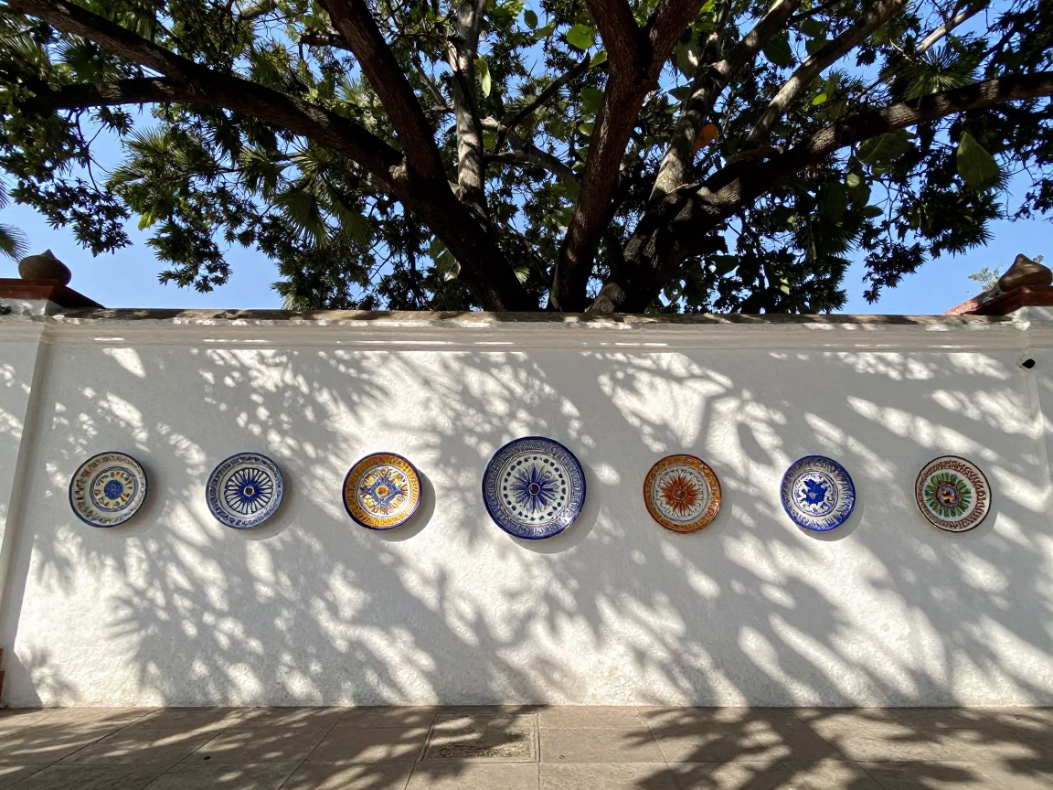 Merida Plaza Morning Light Dappled Shadows Majolica Plates in in Merida, Mexico