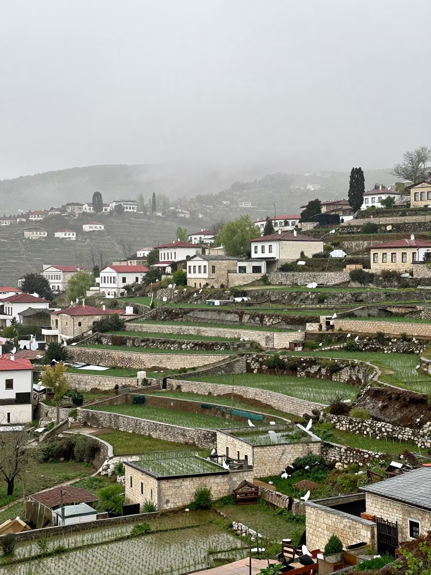 Mersin Hillside Village Misty Dawn After Rain in across a floodplain after rain near Mersin