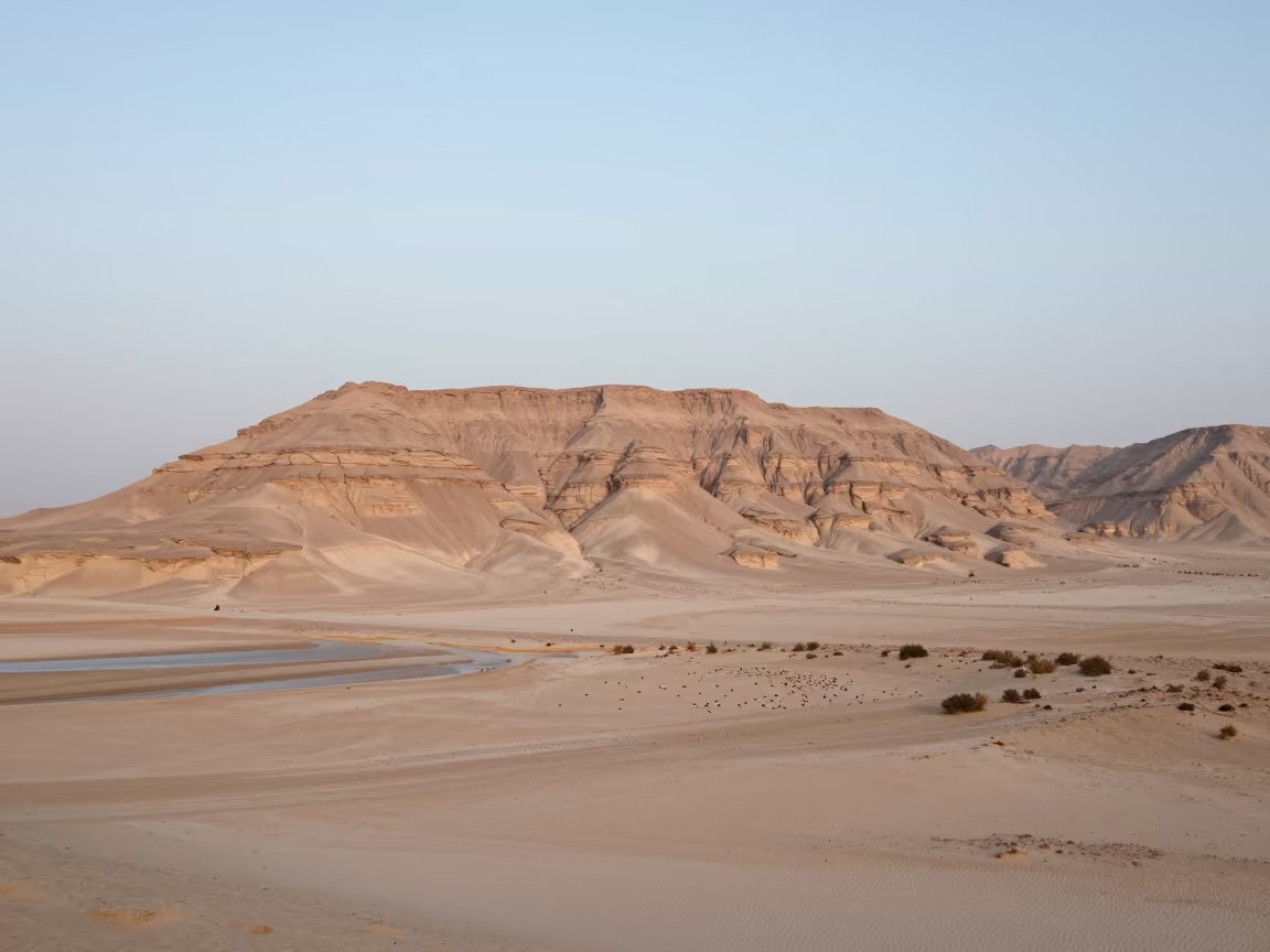 Mesa Rising From Flat Desert Shoreline at Dawn in along a wave-cut shoreline in Egypt