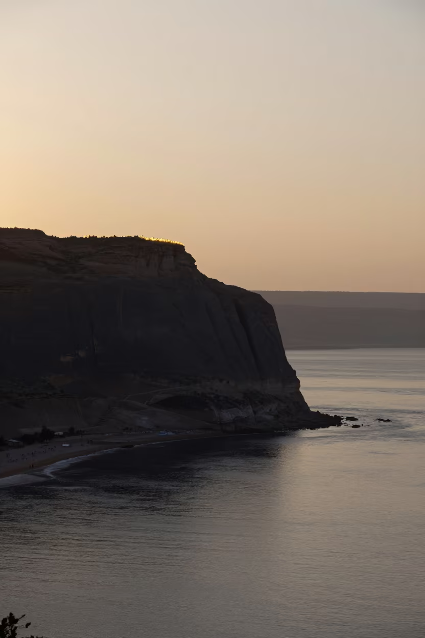Mesa Silhouette at Dawn on Jordan Shoreline in along a wave-cut shoreline in Jordan