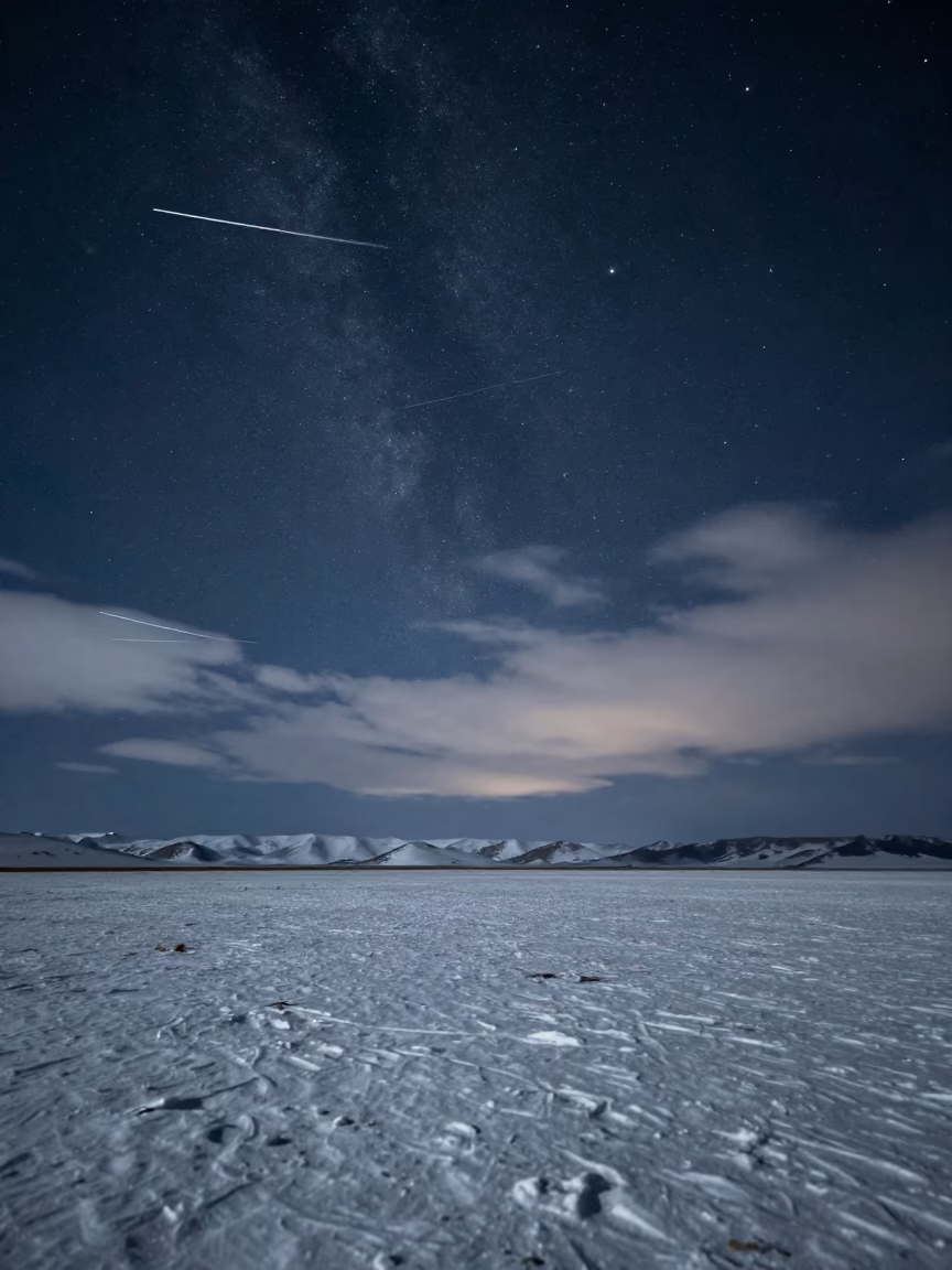 Meteor Shower Over Lhasa Snowfield Night Sky in beneath thin cloud gaps and stars near Lhasa