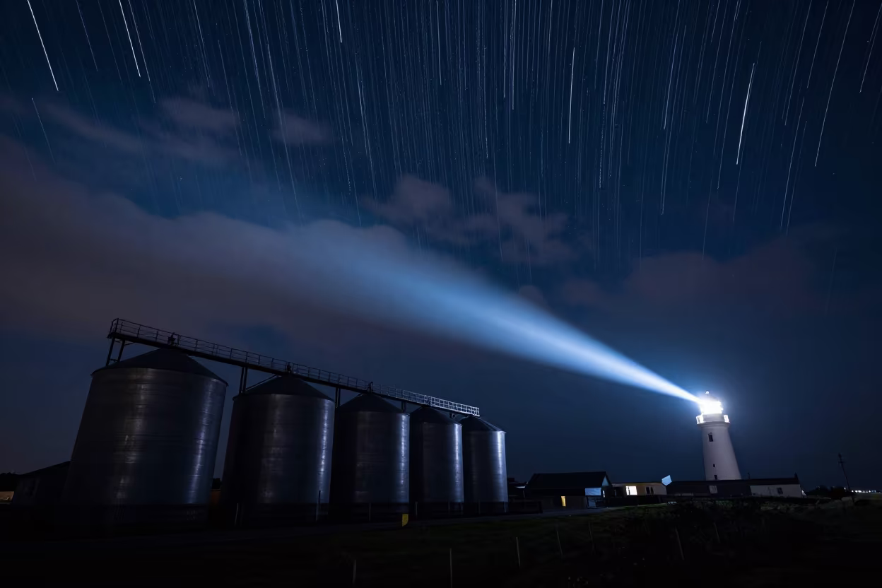 Meteor Shower Over Northern Ireland Silo Row in beneath thin cloud gaps and stars in Northern Ireland