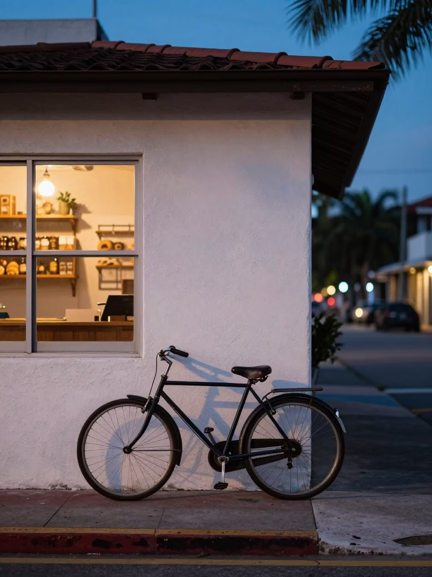 Miami Florida Blue Hour Street Scene with Bicycle and Bakery at Dusk in in Miami, Florida, United States