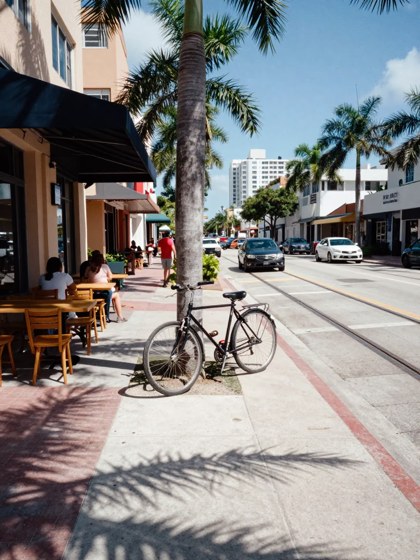 Miami Florida Noon Sunlight Monorail Track and Bicycle Cafe Scene in in Miami, Florida, United States