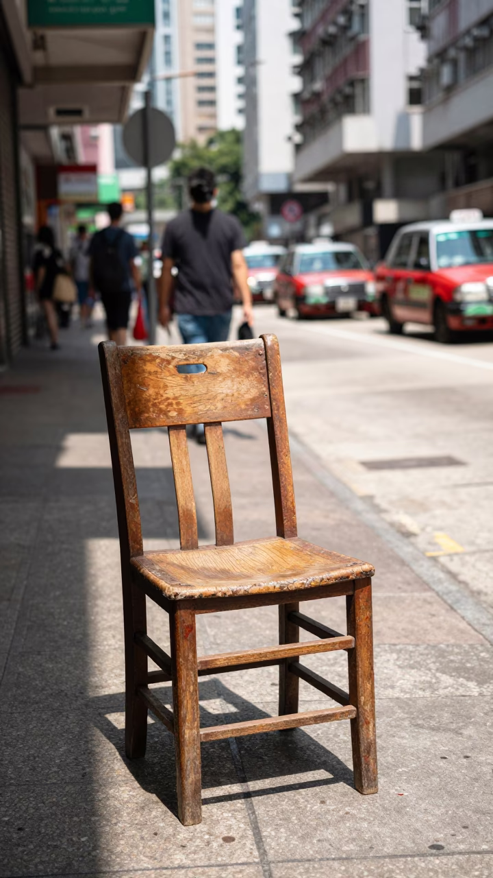 Midday Hong Kong Street Scene with Vintage Chair and Urban Horizon in in Hong Kong, Hong Kong