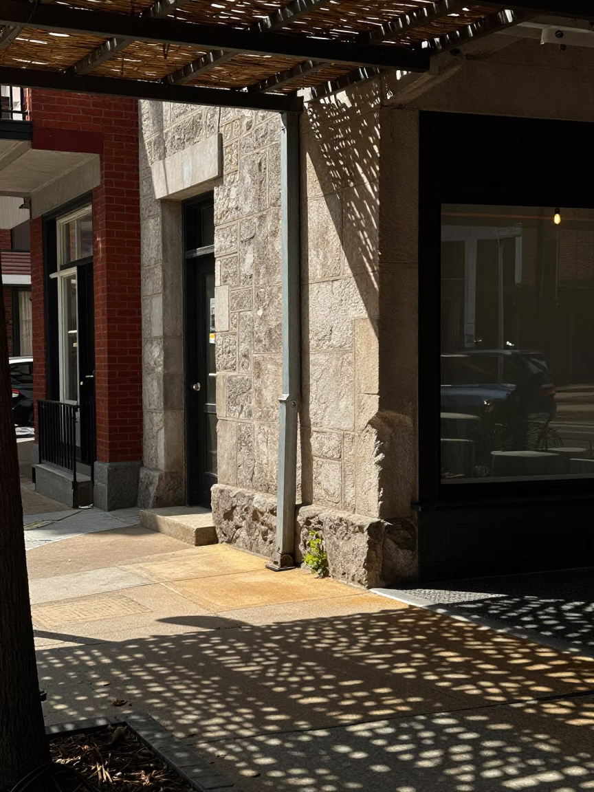 Midday Philadelphia Street Scene with Wicker Shadows and Stone Archway Details in in Philadelphia, Pennsylvania, United States