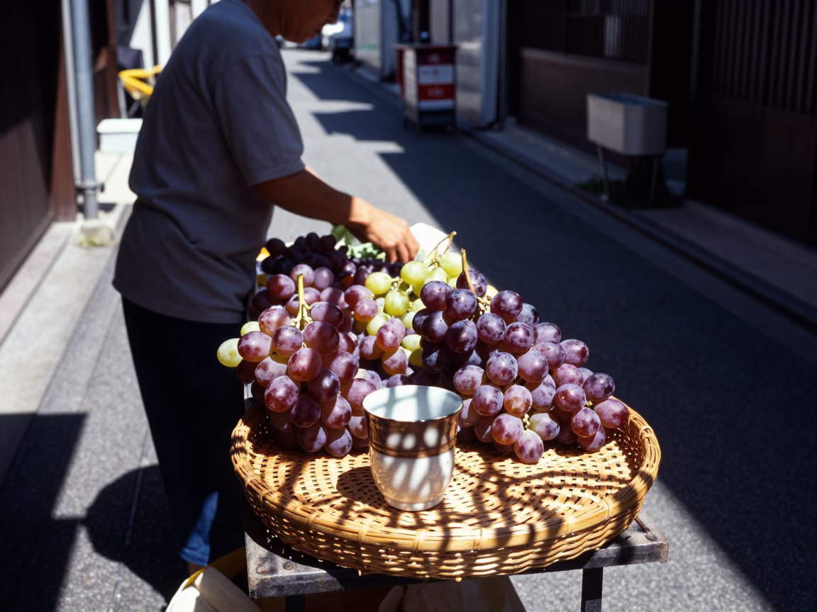 Midday Street Scene in Fukuoka Japan with Grapes and Wicker Shadows in in Fukuoka, Japan