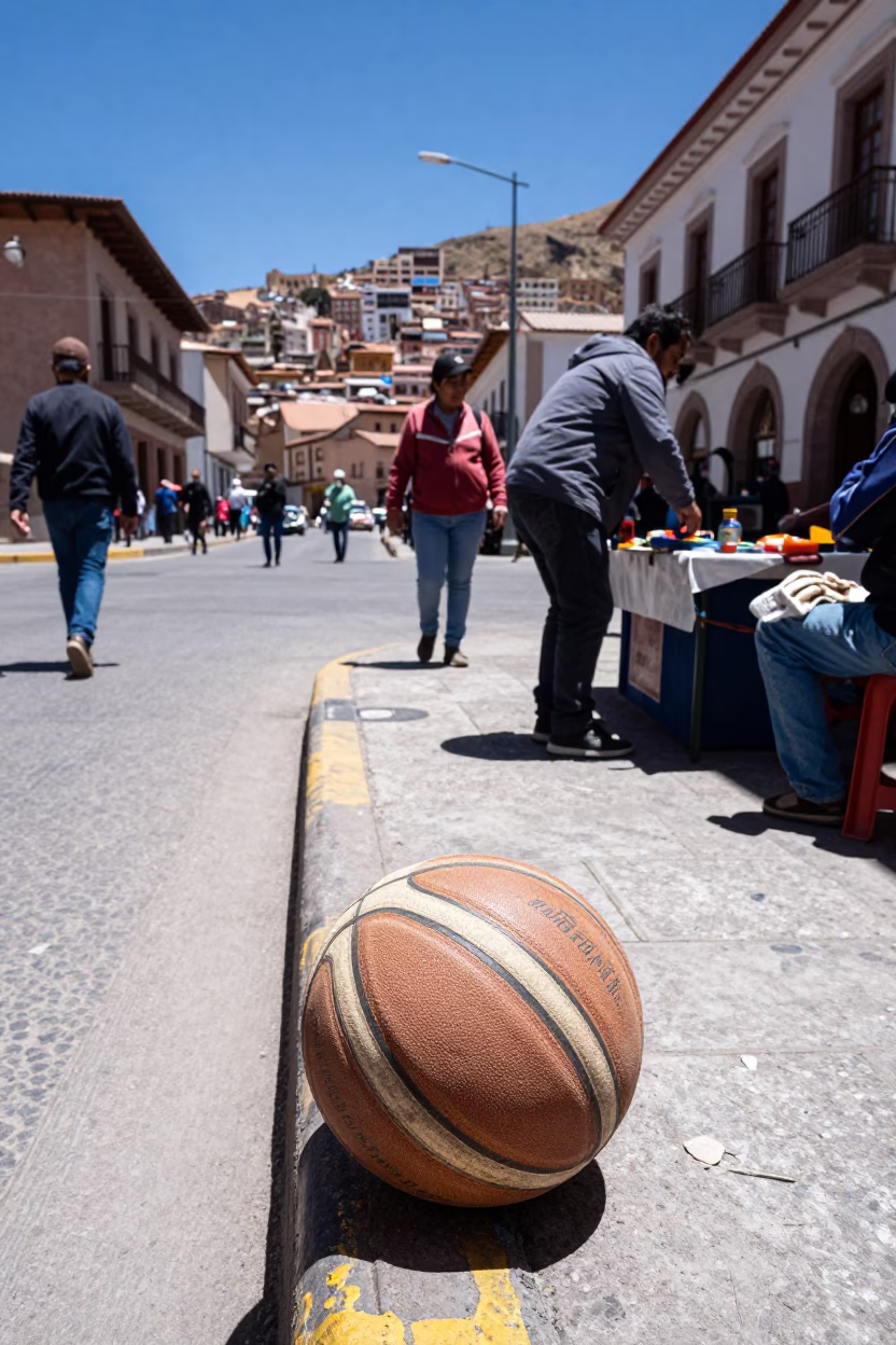 Midday Street Scene in La Paz Bolivia with Old Leather Basketball and Urban Landscape in in La Paz, Bolivia