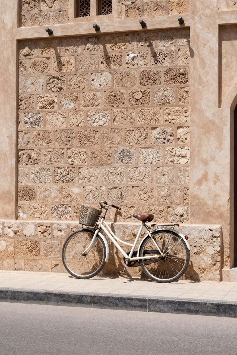 Midday Street Scene in Muscat Oman with Bicycle and Traditional Stone Architecture in in Muscat, Oman