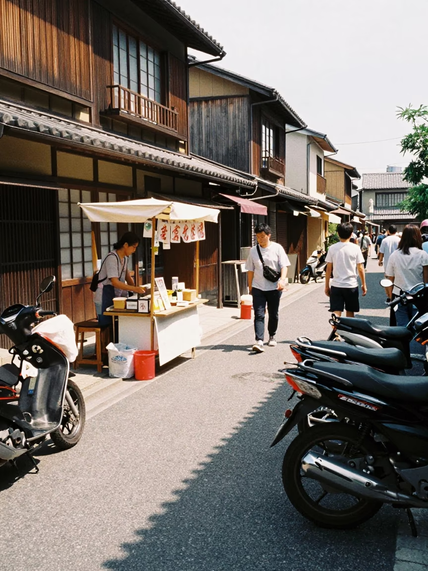 Midday Street Scene in Osaka Japan with Local Vendor and Motorcycles in in Osaka, Japan