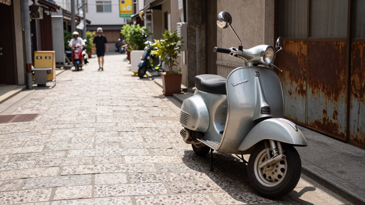 Midday Street Scene in Osaka Japan with Vintage Vespa and Rusty Rail in in Osaka, Japan