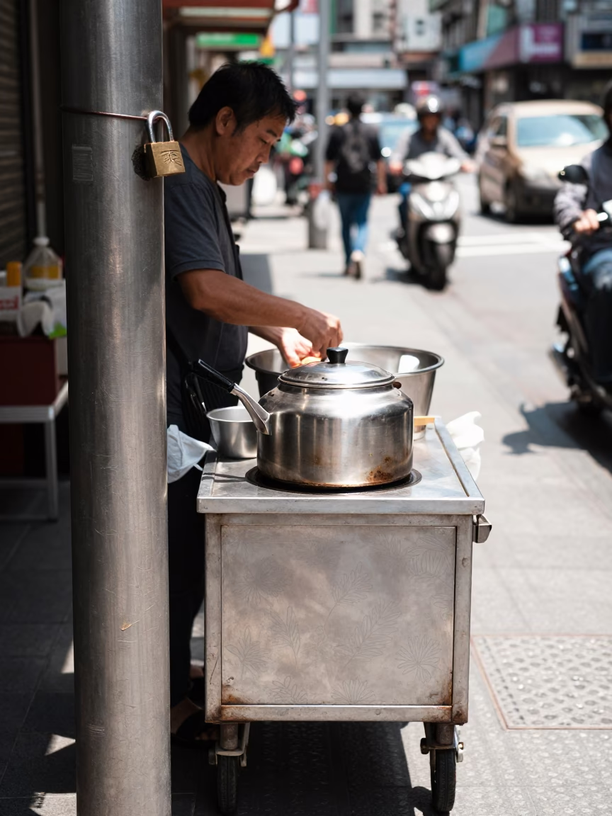 Midday Street Scene in Taipei Taiwan with Padlock and Brushed Steel Kettle Lid in in Taipei, Taiwan
