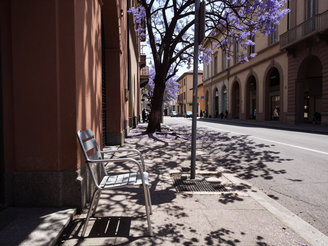 Midday Sunlight on Bologna Italy Street Corner with Jacaranda Bloom and Door Handle Detail in in Bologna, Italy