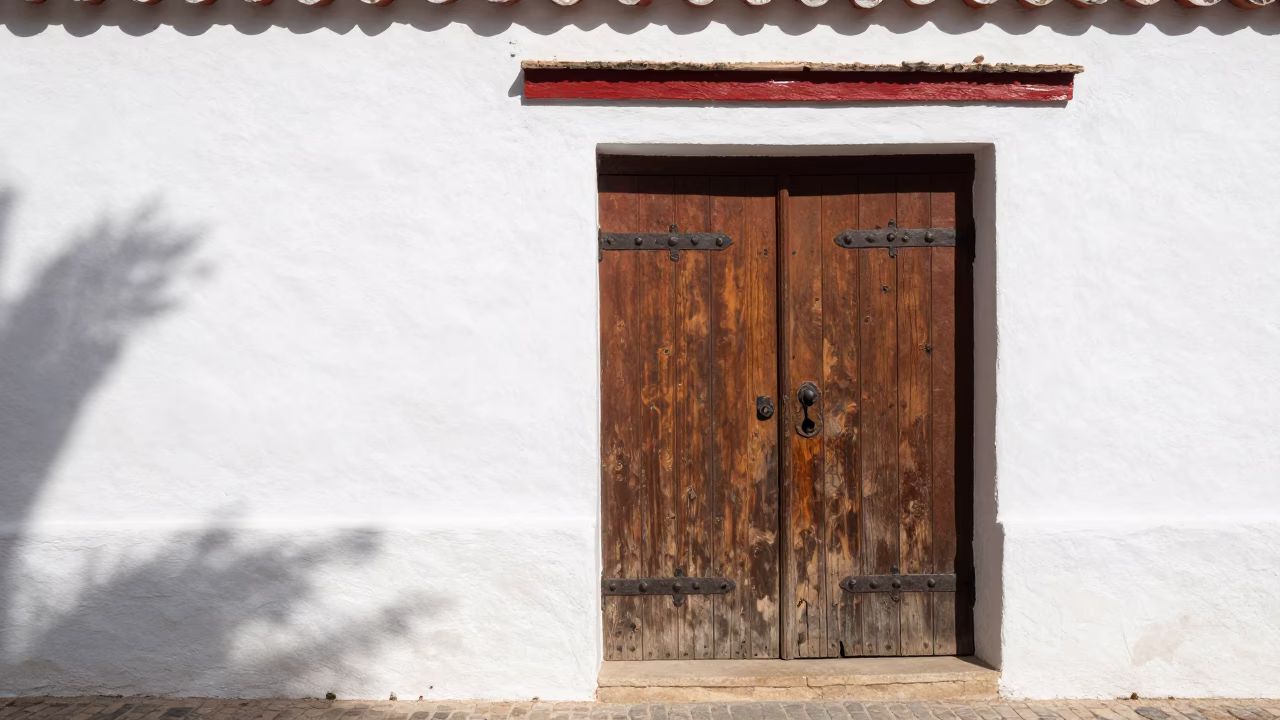 Midday Sunlight on White Washed Walls and Red Brick Architecture in Granada Spain in in Granada, Spain
