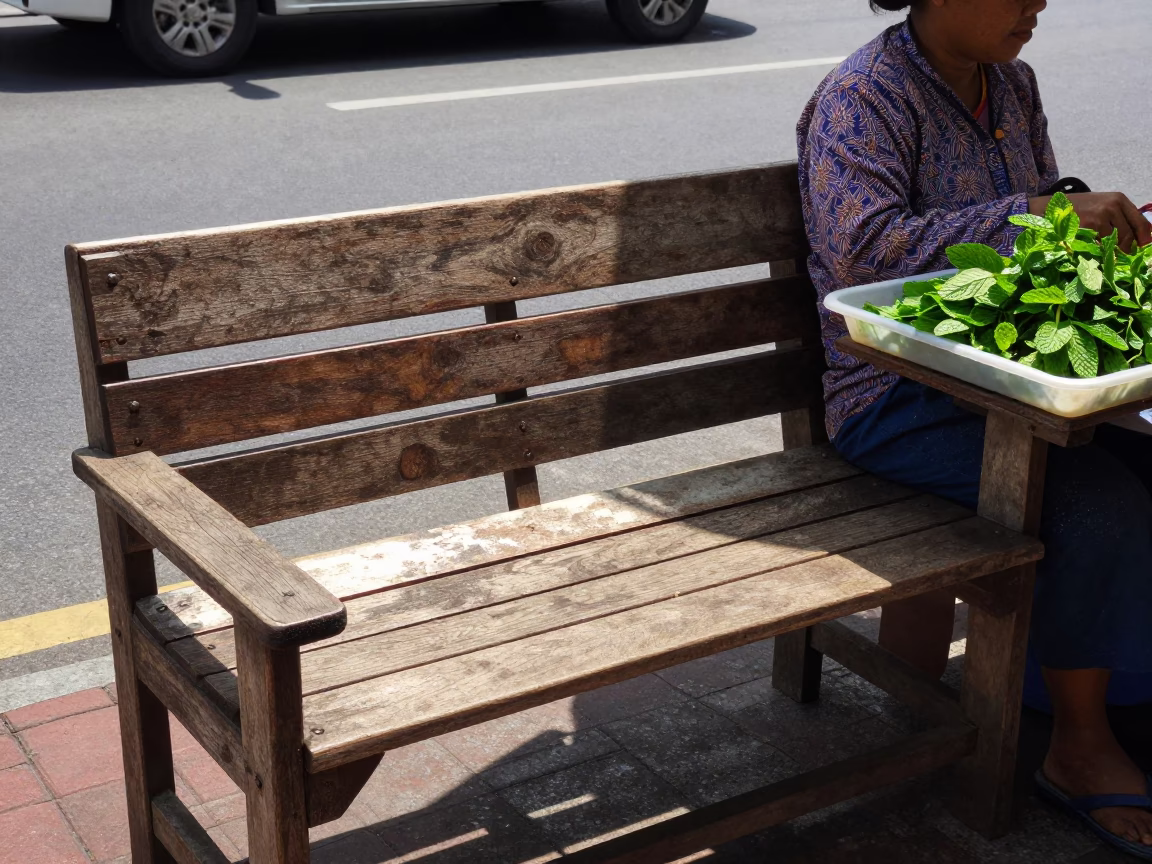 Midday Sunlight Striking Wooden Bench in Phuket Thailand Street Scene in in Phuket, Thailand
